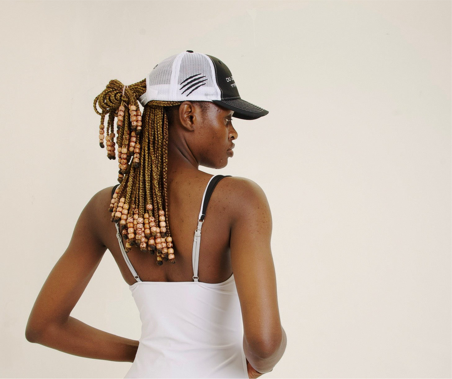 Baseball cap with contrast stitch and embroidery in black and white