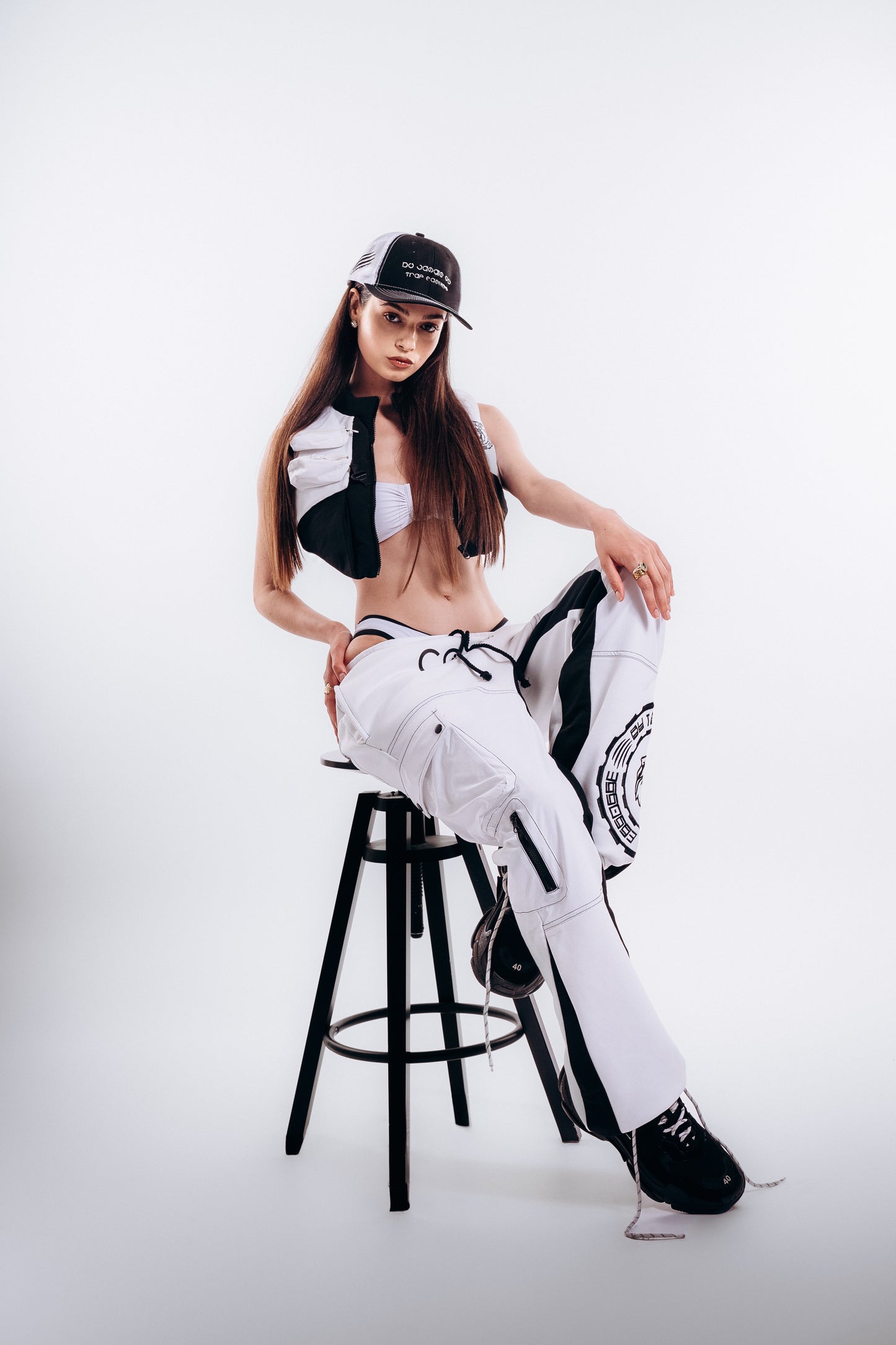 Baseball cap with contrast stitch and embroidery in black and white