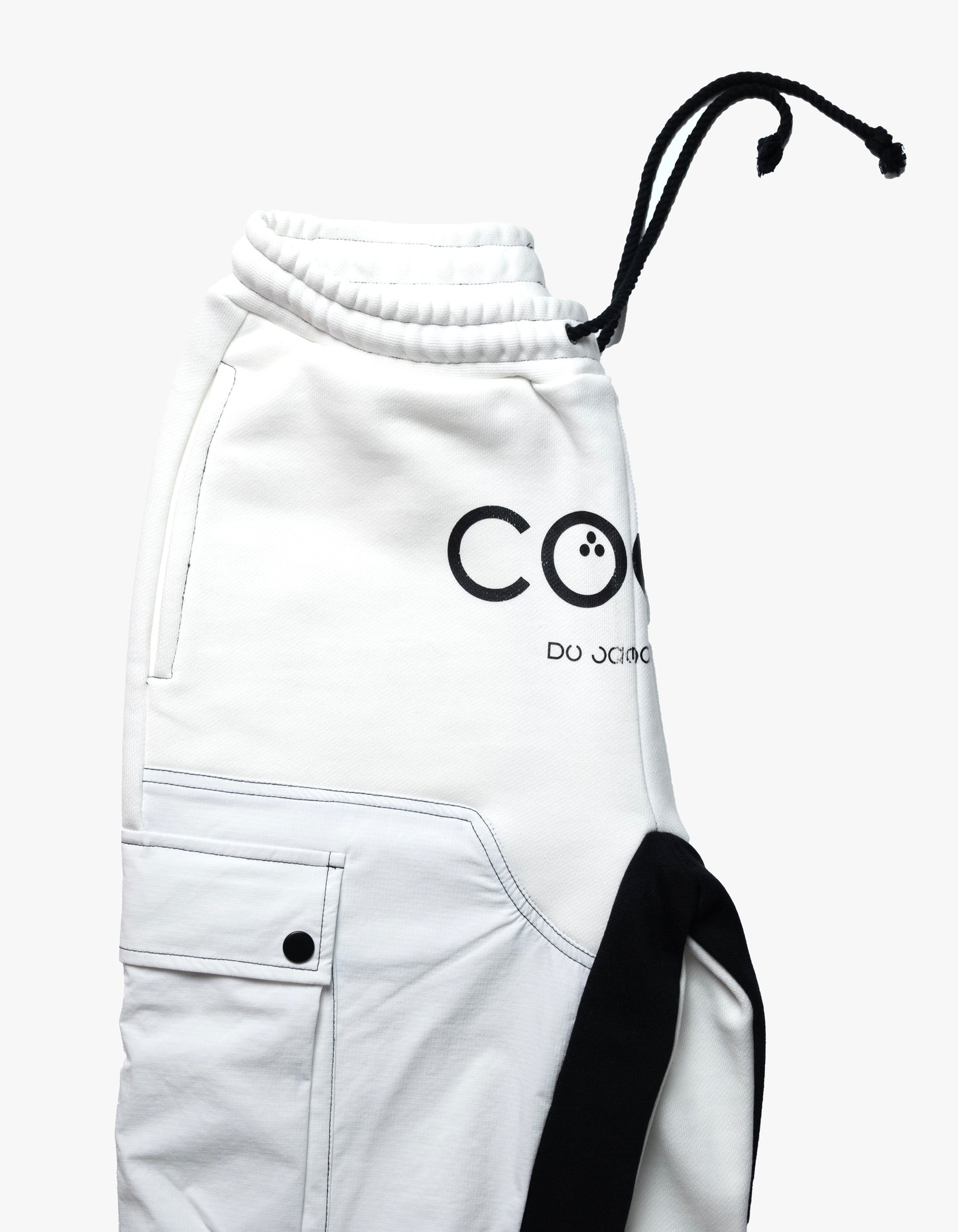 CoCo Flared joggers with cargo pockets and lion face embroidered