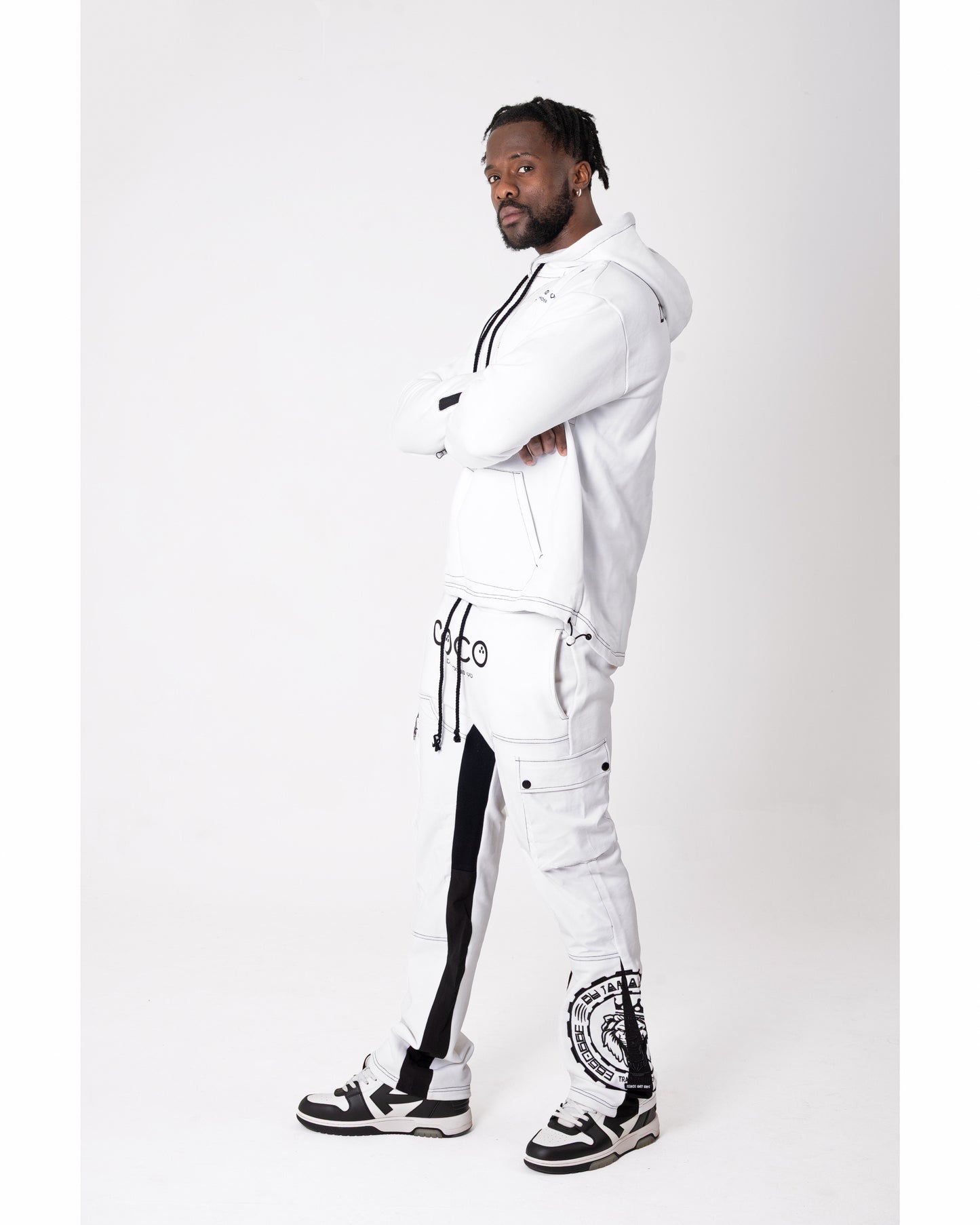 CoCo Flared joggers with cargo pockets and lion face embroidered